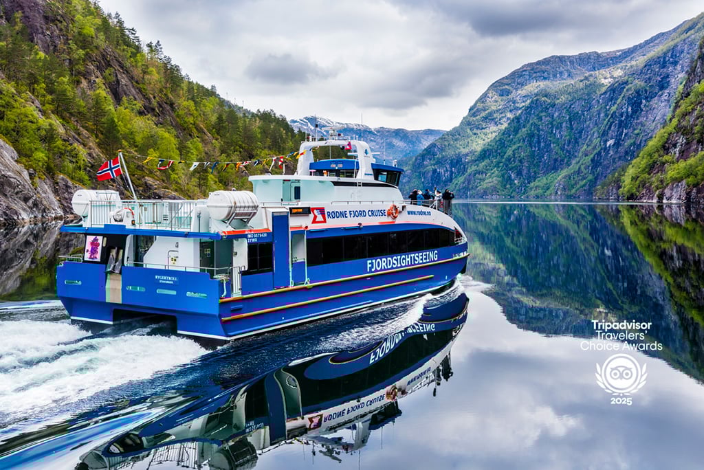 A scenic fjord cruise from Bergen, sailing through Norway’s breathtaking Osterfjord with steep mountains and waterfalls