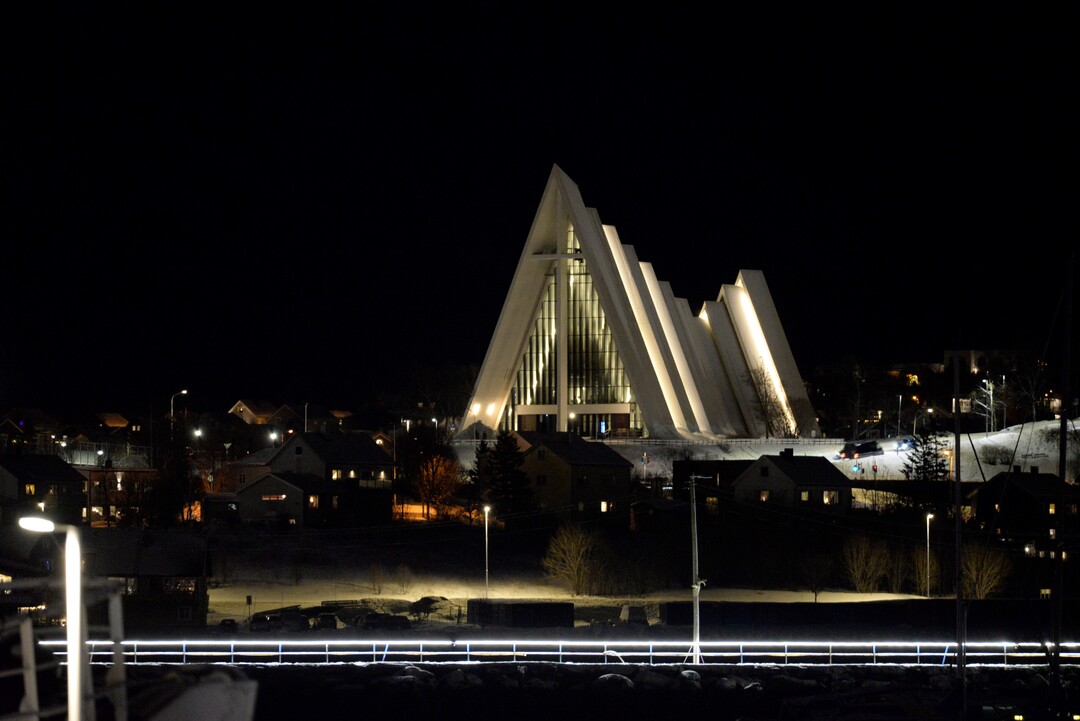 The Arctic Cathedral in Tromsø by night.