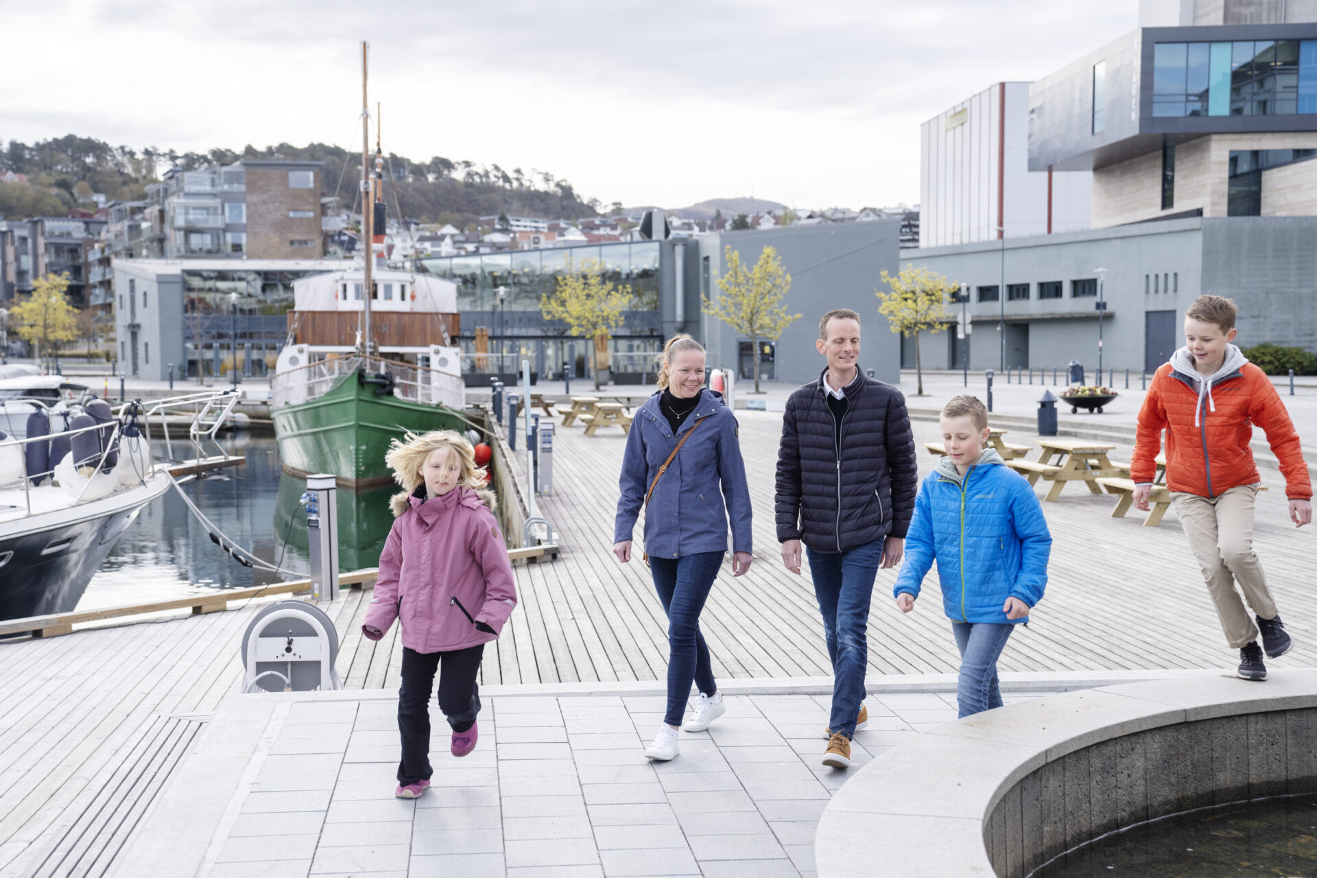 Family walking along the waterfront in Sandnes near the harbour